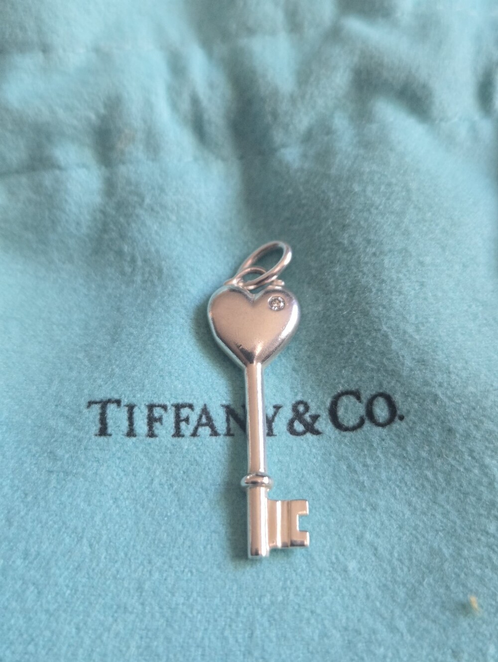 Tiffany & Co. Sterling Silver Heart Key Charm with Tiny Diamond